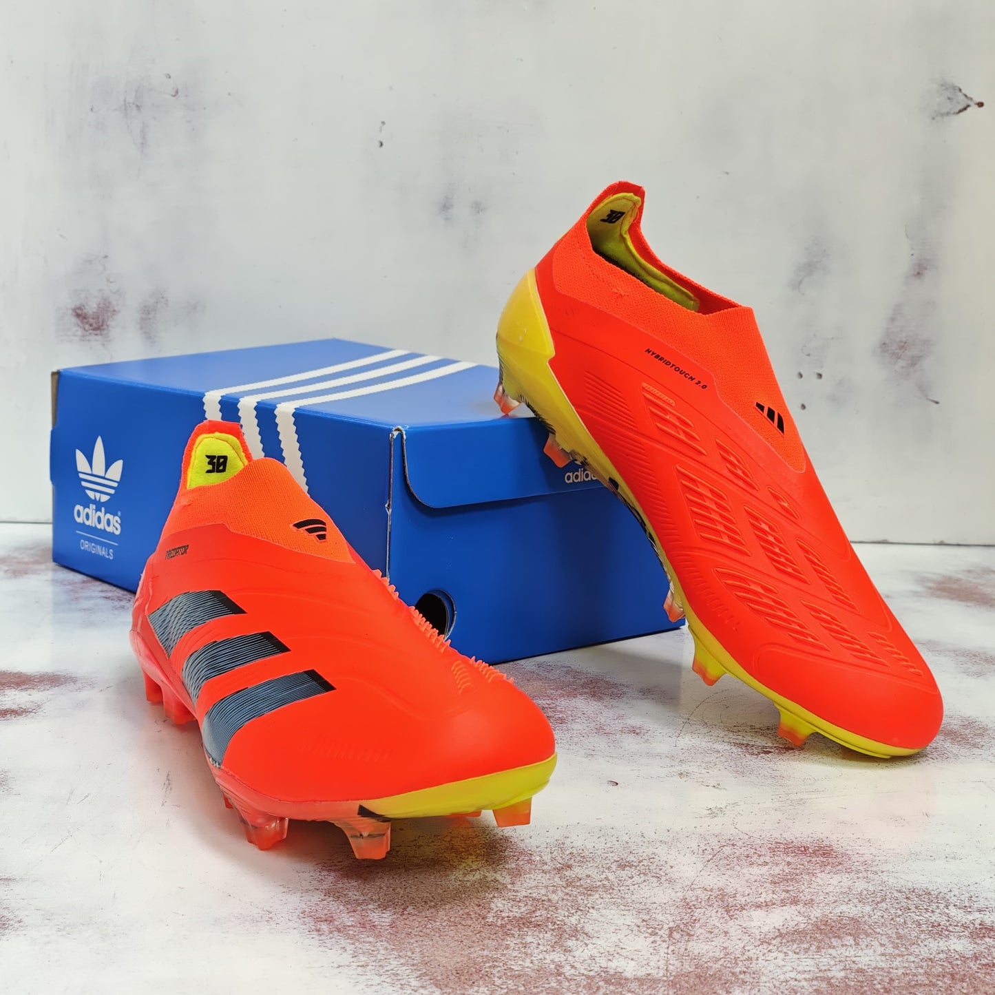 ADDS TACOS PREDATOR ELITE FG SOLAR RED LACE LESS