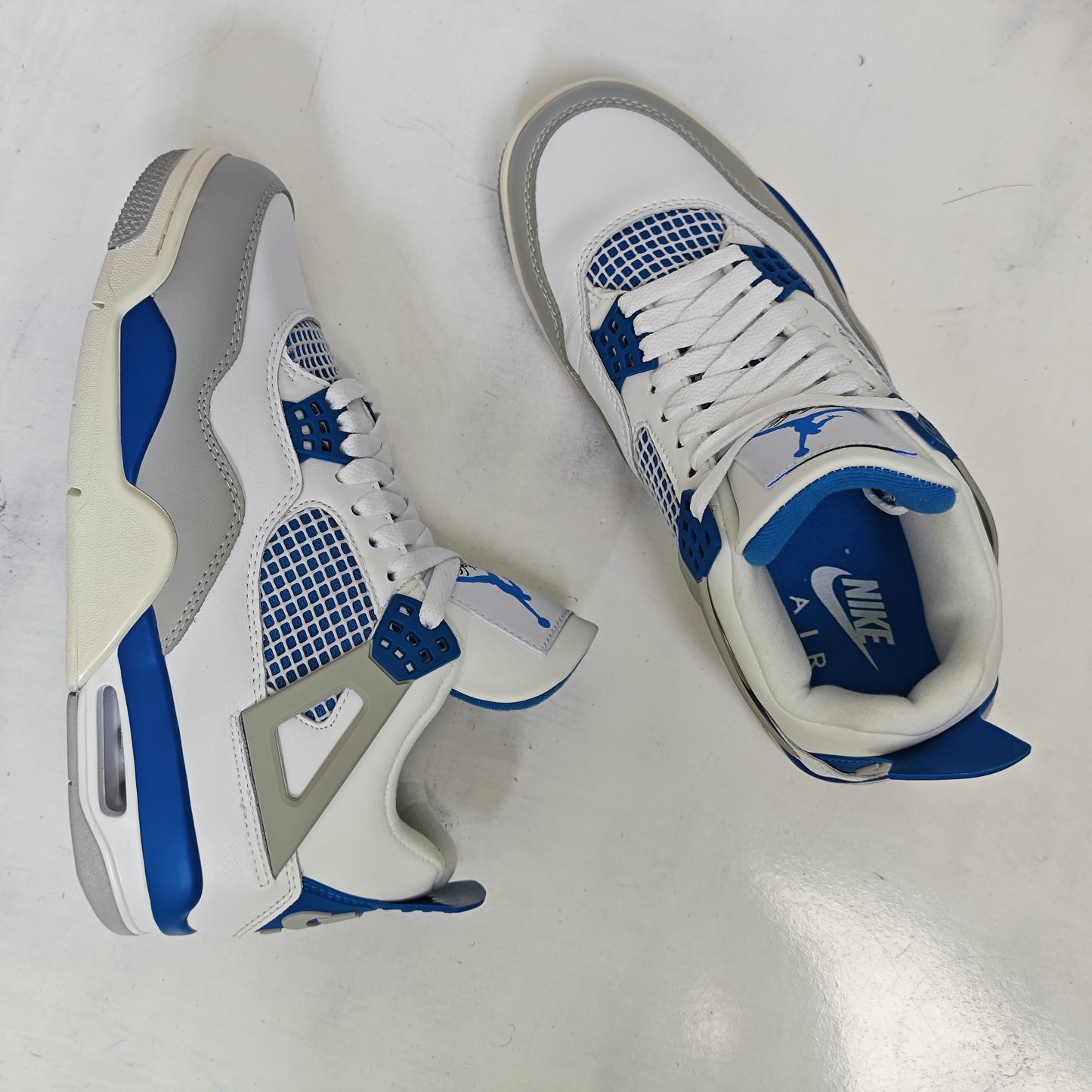 JRDN RETRO 4 MILITARY BLUE INDUSTRIAL